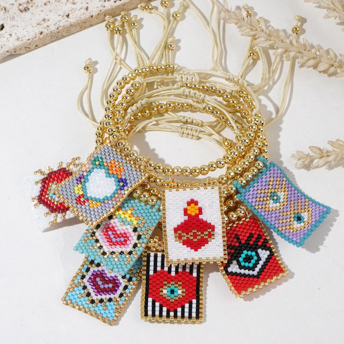 Foreign Trade Hot-Selling Bohemian Style Fashion Versatile Copper Bead Woven Heart Rice Bead Pendant Bracelet Wholesa...