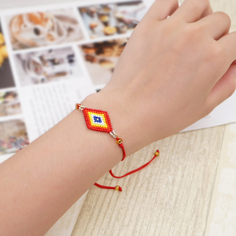 Hand-woven Rice Bead Bracelet Red Rope Adjustable Glass Devil's Eye High-end Luxury European and American Cross-border Jewelry