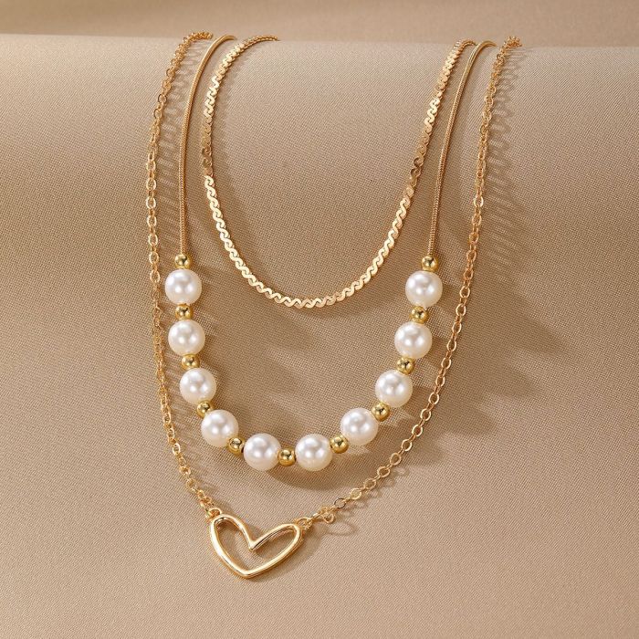Cross-Border Fashion Hot-Selling Retro Heart Peach Heart Pearl Gold Necklace 3-Piece Set Multi-Layer Stacking Collarbone Chain for Women