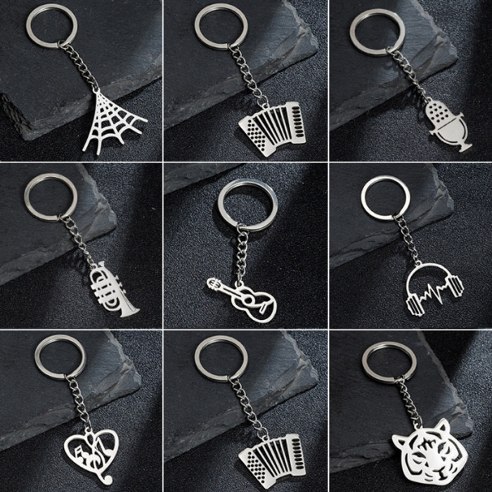 Minimalist Foreign Trade New Accessories Stainless Steel Musical Instrument Halloween Spider Web Creative Keychain Pendant Couple