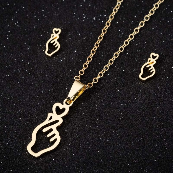 Christmas Fashion Simple Galloping Deer Snowflake Feather Hollow Skull Stud Earrings Necklace Wholesale