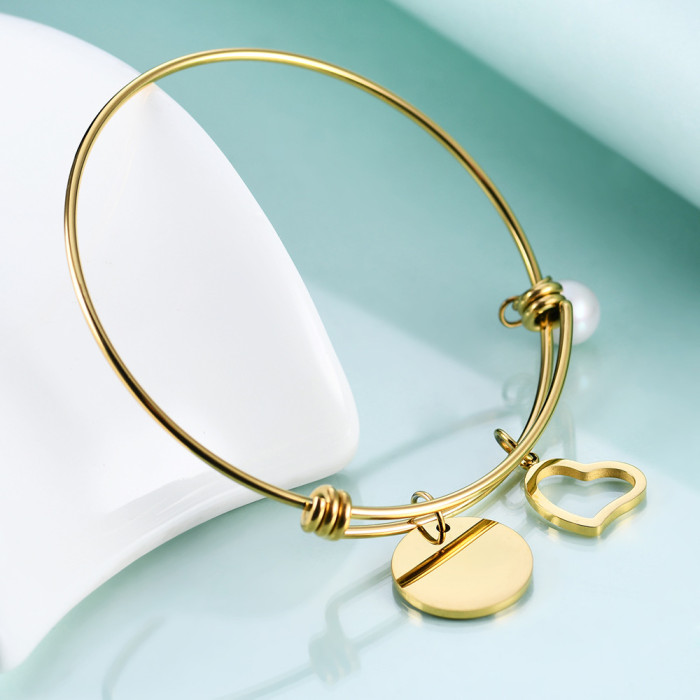 European and American Hot-Selling Fashion Titanium Steel 18K Gold Round Pendant Versatile Bracelet Heart Stainless Steel Bracelet Laser Logo