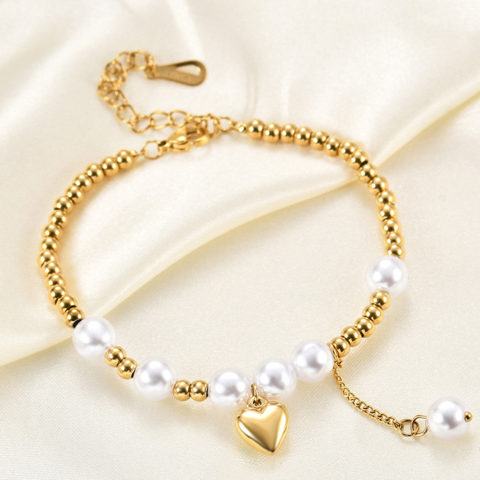 Manufacturer Wholesale European and American New Style Simple Versatile Smooth Heart Splicing Imitation Pearl Round Bead Bracelet with Laser Logo