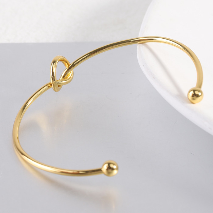 European and American Cross-Border Hot Sale 62MM Heart Knot Bracelet for Women, Open Rose Gold Stainless Steel Bracelet Wholesale for Women