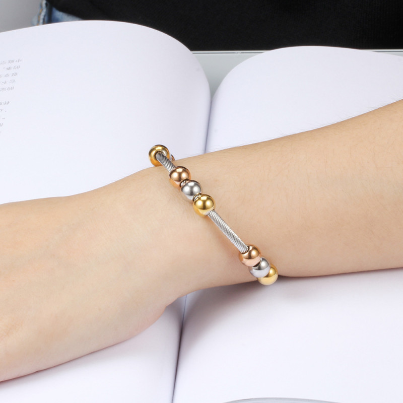 Manufacturer Wholesale Adjustable Spring Twist Chain Titanium Steel Bracelet Three-Color Beads European and American Fashion Personality Bracelet Hot Sale for Women