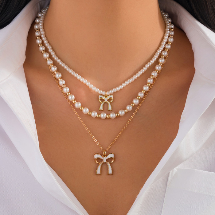 Jewelry French Elegant Pearl Beaded Collarbone Chain Fashion Metallic Bow Pendant Necklace