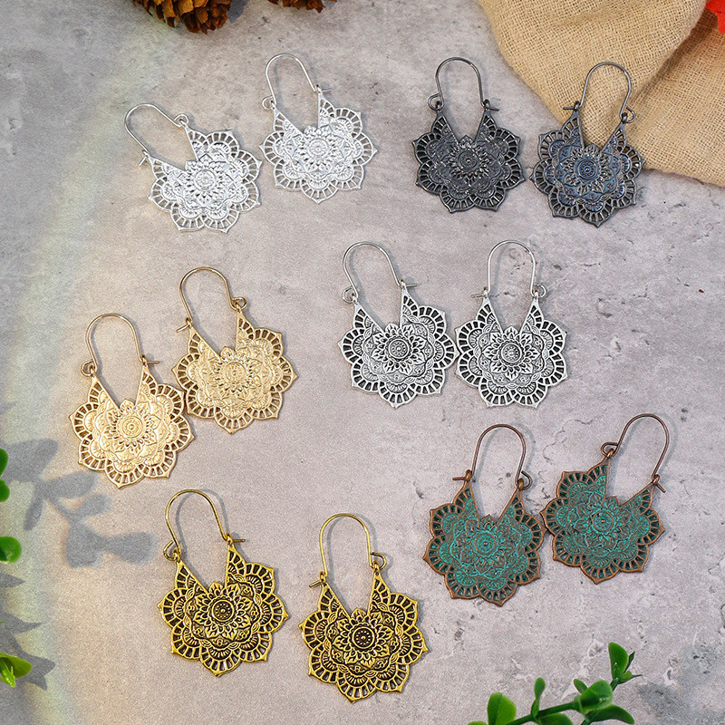European and American Ethnic Style Metal Hollow Floral Earrings Bohemian Carved Palace Style Earrings Manufacturer Wholesale
