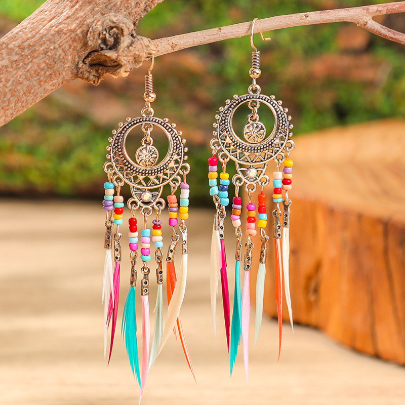 New Round Hollow Exquisite Earrings Bohemian Fashion Feather Tassel Earrings Exotic Style Accessories Wholesale