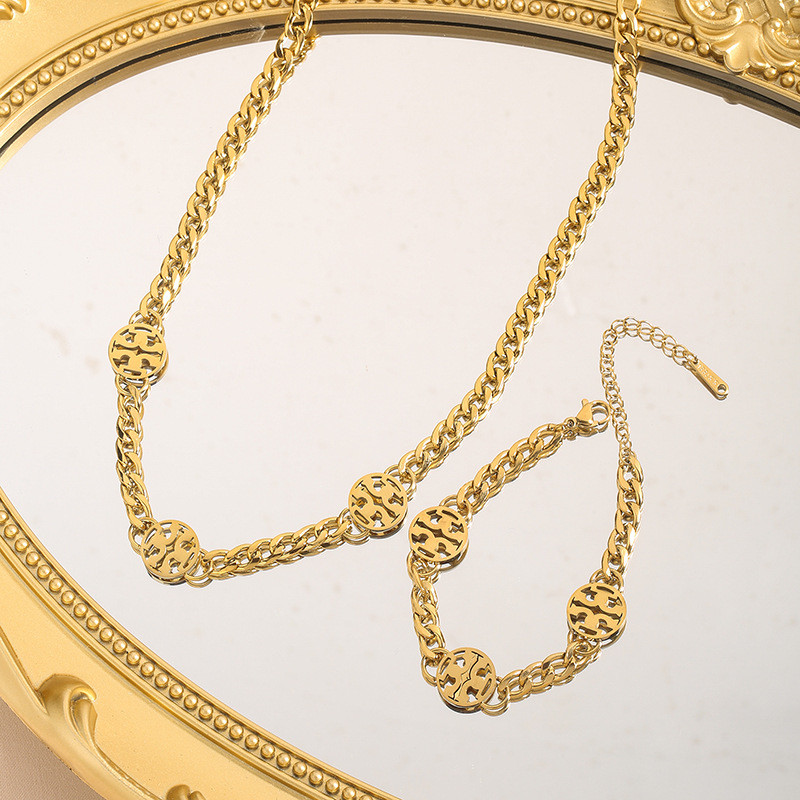 European and American Fashion Titanium Steel Simple Elegant Round Hollow Logo Necklace Light Luxury Niche Design Versatile Set Accessories