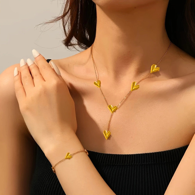 European and American Cross-Border Wholesale Sweet Style Peach Heart Tassel Necklace for Women Niche Design Heart Bracelet Titanium Steel Jewelry Set