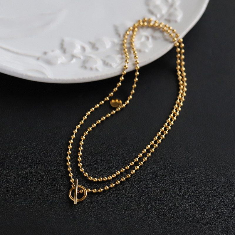 Cross-Border Wholesale Mid-Length Sweater Chain Titanium Steel Plated 18K Gold Stacked OT Buckle Necklace Women Trendy Collarbone Chain Design Sense