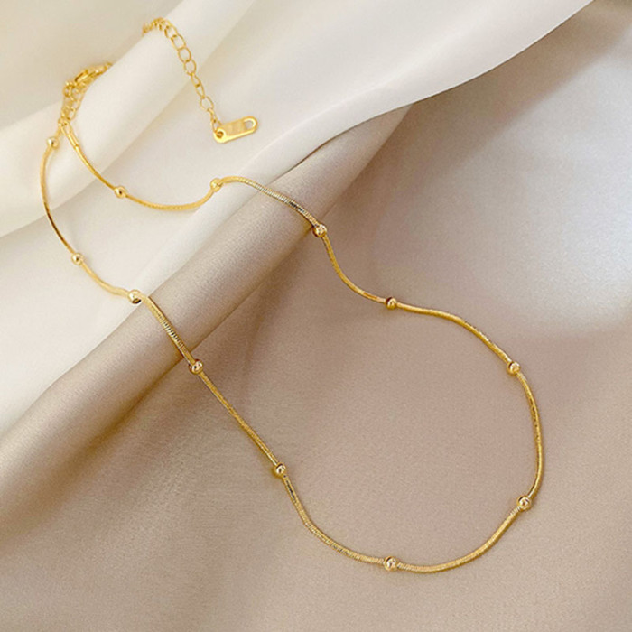 Wholesale Japanese and Korean Simple Titanium Steel Necklace Ins Transfer Bead Snake Chain Golden Bean Niche High-End...
