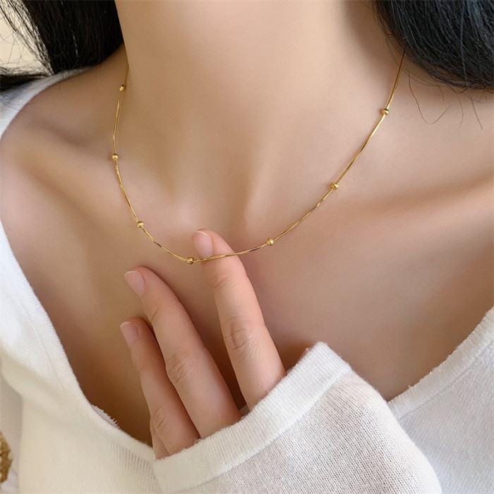 Wholesale Japanese and Korean Simple Titanium Steel Necklace Ins Transfer Bead Snake Chain Golden Bean Niche High-End...