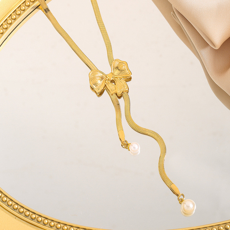 European and American Cross-Border Flower Tassel Necklace Irregular Round Collarbone Chain Pearl Pendant Design Sense Bowknot Necklace