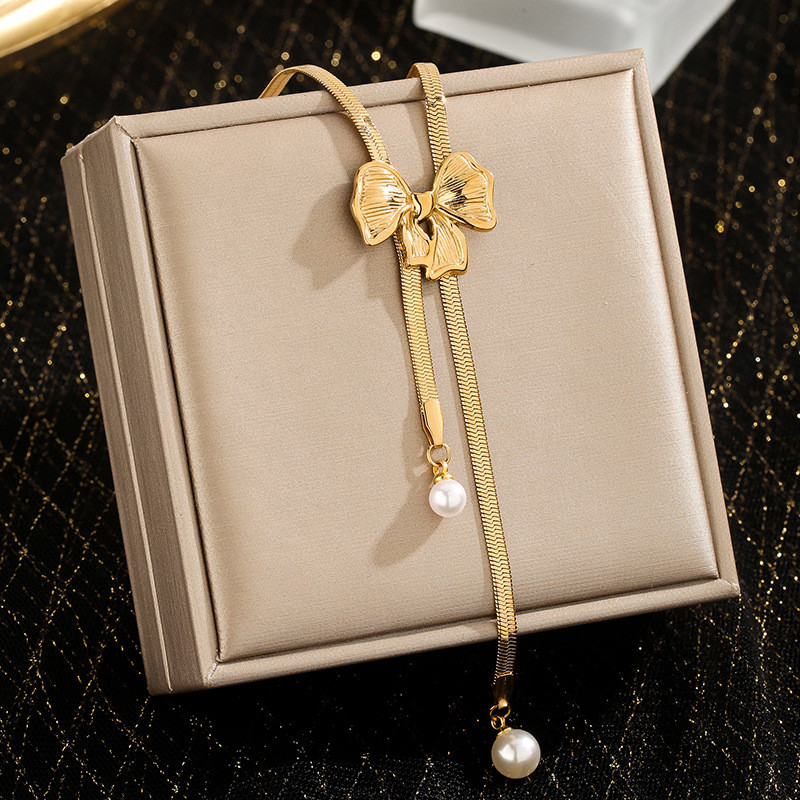 European and American Cross-Border Flower Tassel Necklace Irregular Round Collarbone Chain Pearl Pendant Design Sense Bowknot Necklace