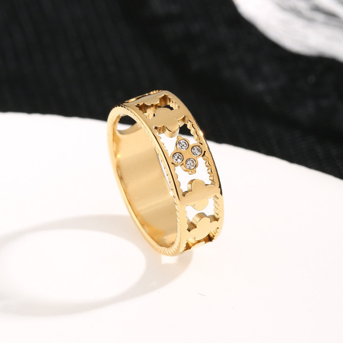Hot-Selling Trendy Fashion Hollow Four-Leaf Clover Titanium Steel Ring for Women with Stone-Inlaid, Unique Fresh S...