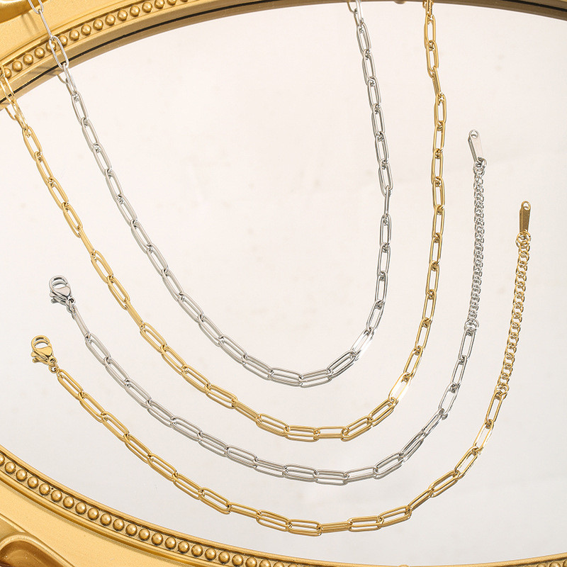 European and American Style Hip-Hop Trend Geometric Element Fashion Simple Titanium Steel Bare Plated 18K Gold Bracelet Clavicle Chain Set