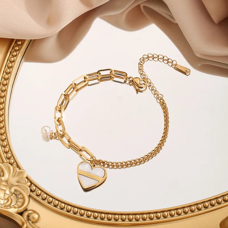 Cross-Border Wholesale European and American Niche Design Fashion High-End Retro Irregular Pearl Heart Pendant Titanium Steel Bracelet for Women
