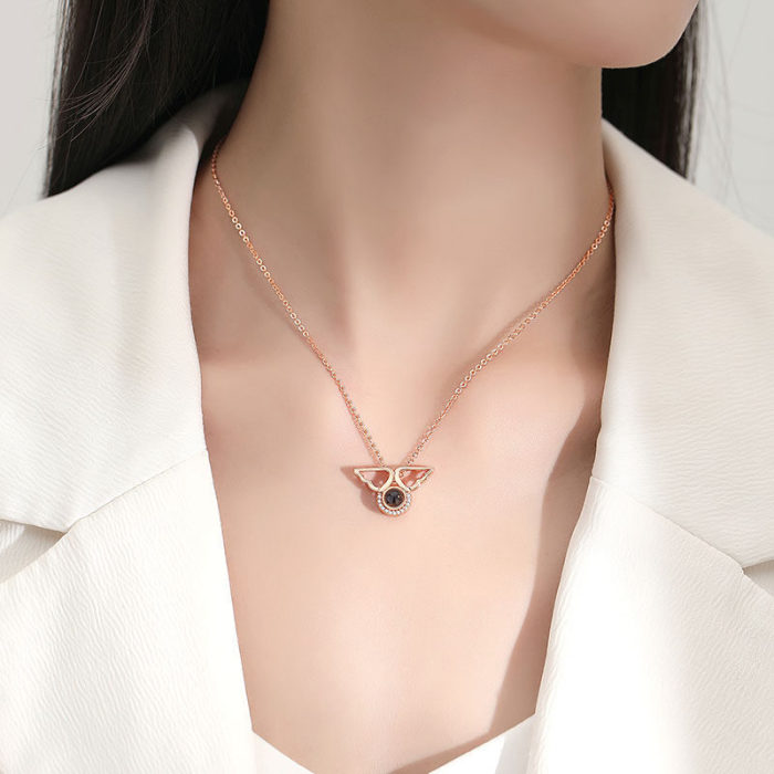 Angel Wings Projection Necklace with 100 Languages  I Love You  Fashion Collarbone Chain Wholesale