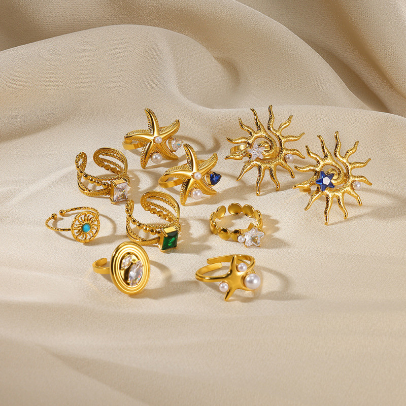 European and American New Style Stainless Steel 18k Gold Plated Pearl Zircon Ring for Women Hollow Sun Geometric Open Starfish Ring