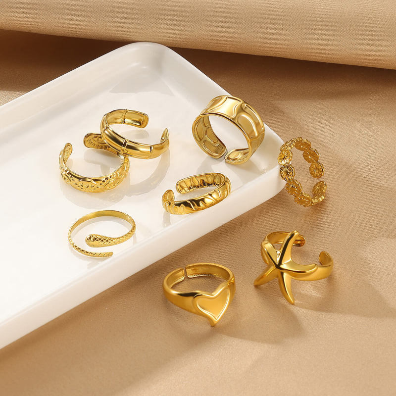 Amazon Simple New Women's Heart-shaped Ring Stainless Steel Gold-plated Snake Open Texture Starfish Ring Wholesale