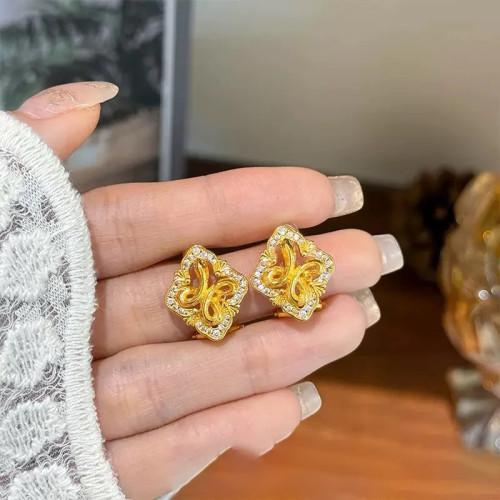 2025 New Vintage Four-Leaf Clover Snake Diamond-Studded Earrings for Women Boutique Style Niche Design Light Luxury Fashion Earrings