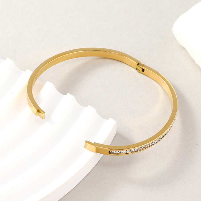 New Stainless Steel Jewelry High-End Gold Inlaid with a Row of Round Stones Clasp O-Shaped Titanium Steel Bracelet...