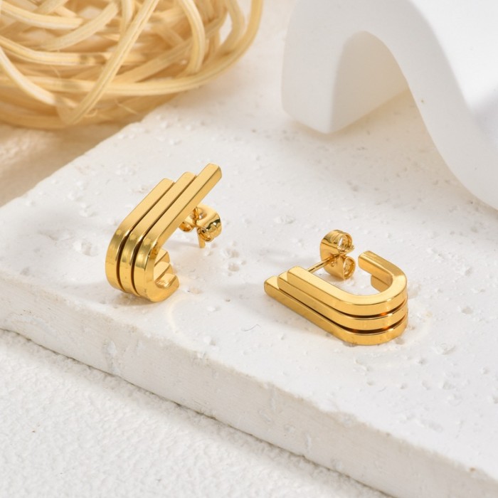 Retro Starry Sky Stainless Steel Earrings Niche High-end Irregular Geometric Simple Yellow Textured Earrings