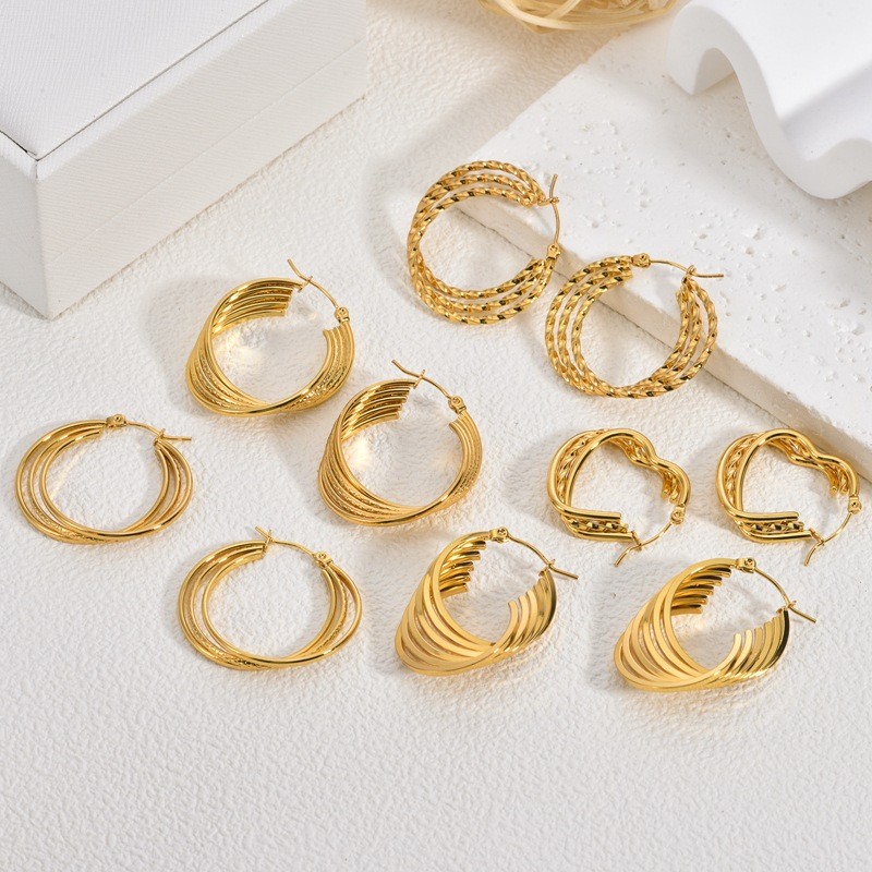 European and American Cross-Border Gold Stainless Steel Earrings Light Luxury High-End Exaggerated Earrings Design Sense Niche Non-Fading Ear Clips