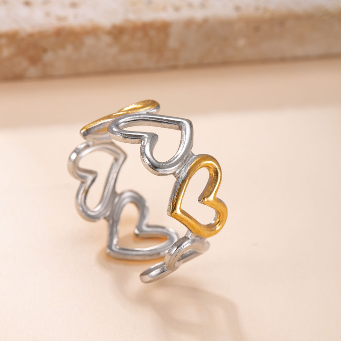Cross-Border Hot Selling Stainless Steel Ring for Women, Niche Design, Color Block Open Ring, Oil Press Hollow Heart Titanium Steel Ring Factory