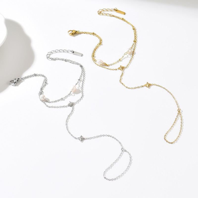 Cross-border ins light luxury gold-plated stainless steel hand chain with water drop zircon and freshwater pearl exquisite finger chain for women