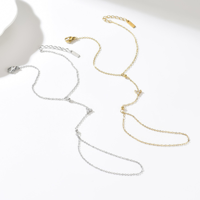 New European and American Amazon gold zircon clover finger chain, unique niche heart-shaped bracelet jewelry gift for girls