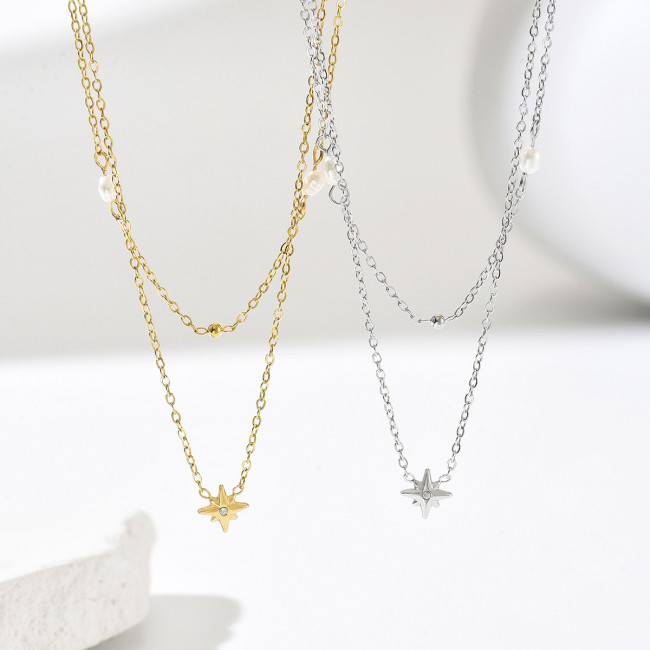 Layered starburst pearl titanium steel double-layer necklace in gold and silver, niche collarbone chain for everyday workplace elegance