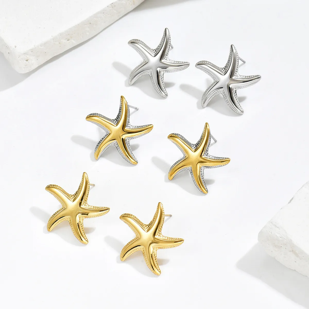 European and American light luxury resort-style starfish earrings for women, niche high-end versatile trendy ocean-themed titanium steel earrings