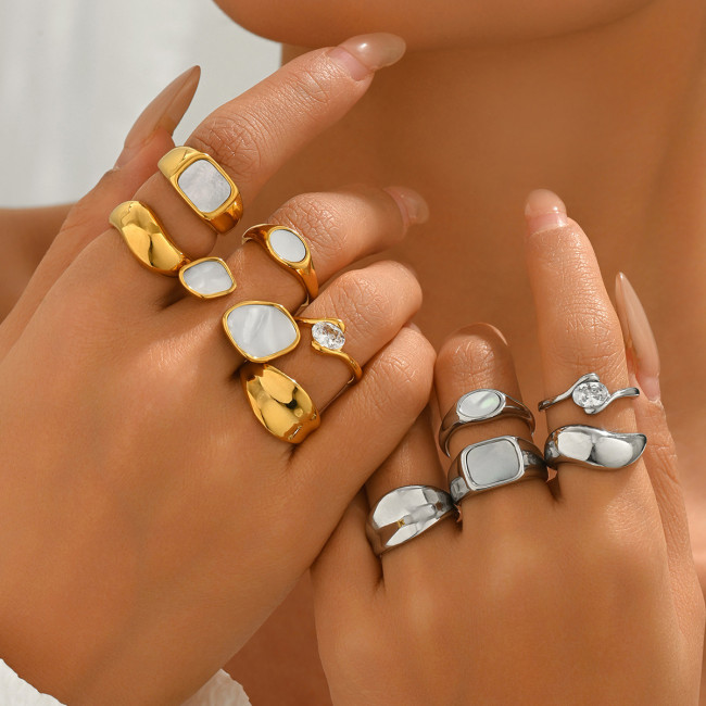 Unique mother-of-pearl geometric two-tone irregular stainless steel ring with irregular texture and diamond embellishments, light luxury fashion ring
