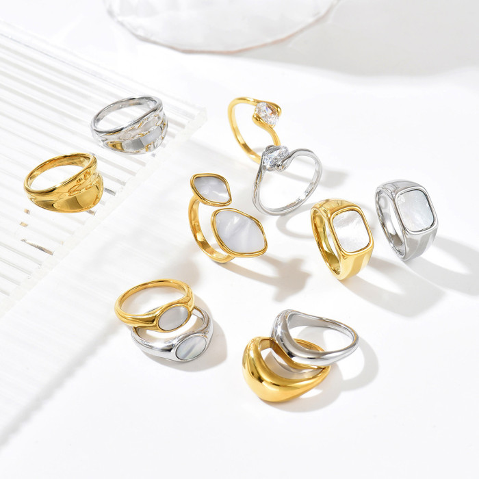 Unique mother-of-pearl geometric two-tone irregular stainless steel ring with irregular texture and diamond embellishments, light luxury fashion ring