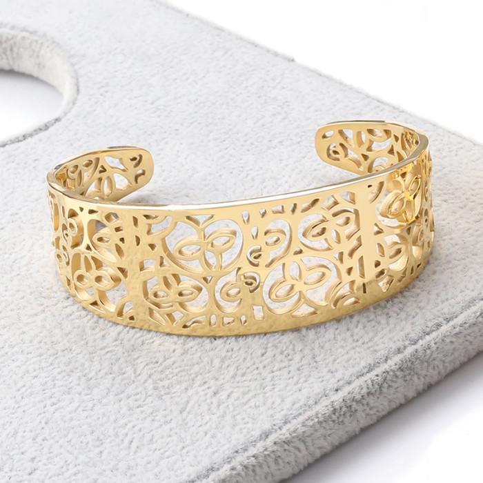 Cross-border European and American floral stainless steel hollow bracelet for women, petal design that does not fade, honeycomb hollow flower pattern titanium steel bracelet