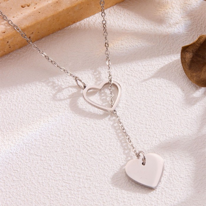 Popular Stainless Steel Heart Necklace with Hollow Heart Ring and Sliding Chain, Unique, Simple, Stylish, High-end Je...