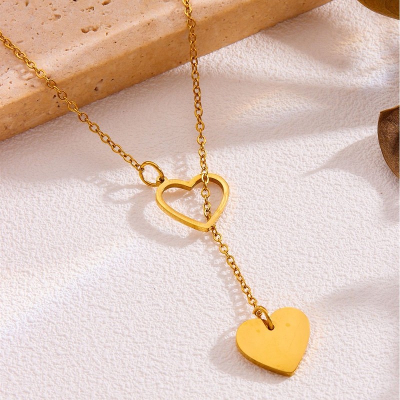 Popular European and American stainless steel heart necklace with hollow heart ring and sliding chain, unique, simple, stylish, high-end jewelry wholesale