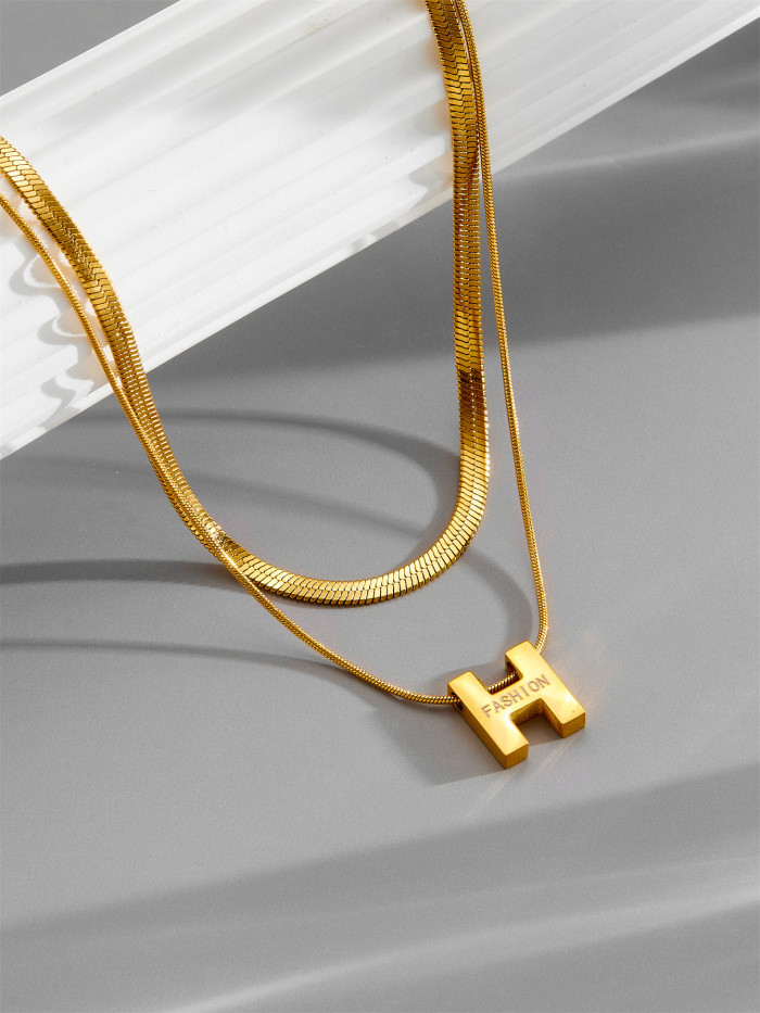 French-style light luxury design snake bone chain letter H double-layer titanium steel necklace for women, elegant collarbone sweater chain wholesale
