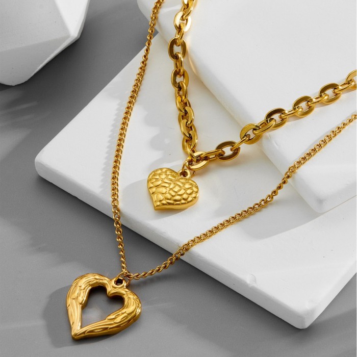 European and American cross-border vintage fashion high-end simple multi-layer titanium steel metal chain textured hollow heart pendant necklace