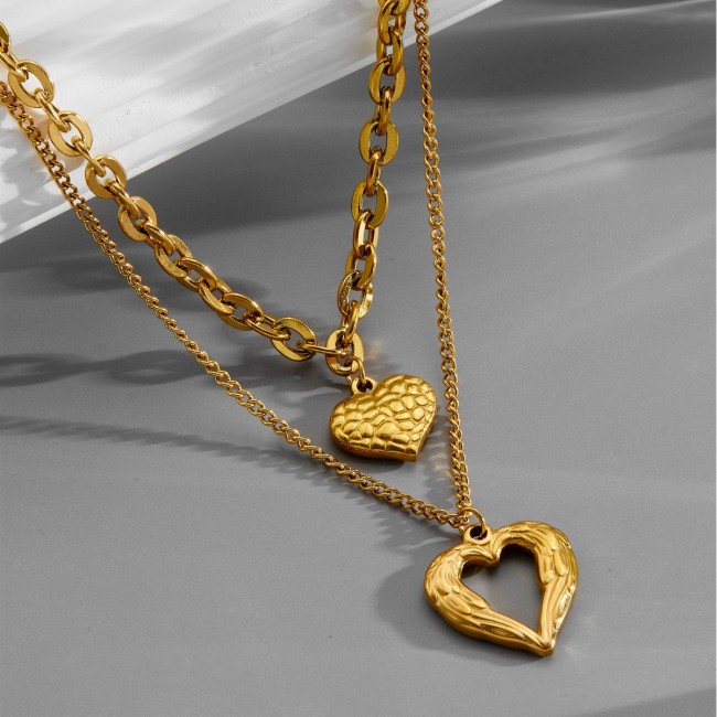 European and American cross-border vintage fashion high-end simple multi-layer titanium steel metal chain textured hollow heart pendant necklace