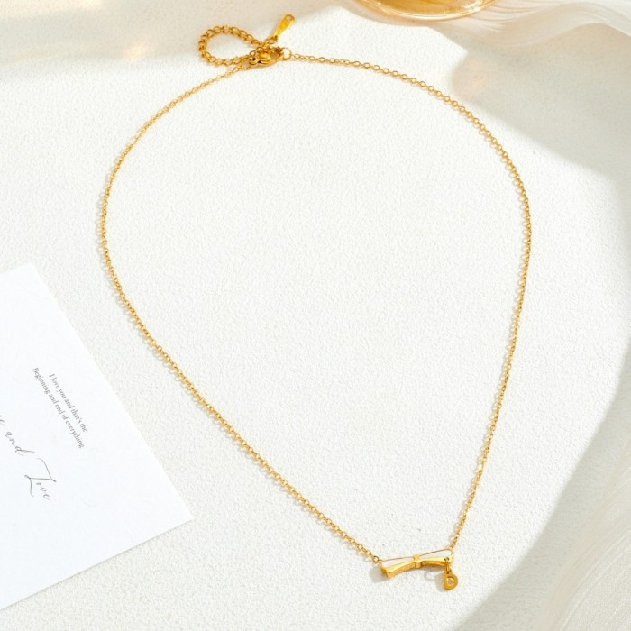New gold-plated bow ribbon necklace for girls, same style as seen on Xiaohongshu, sweet and cute accessories, wholesale from Yiwu