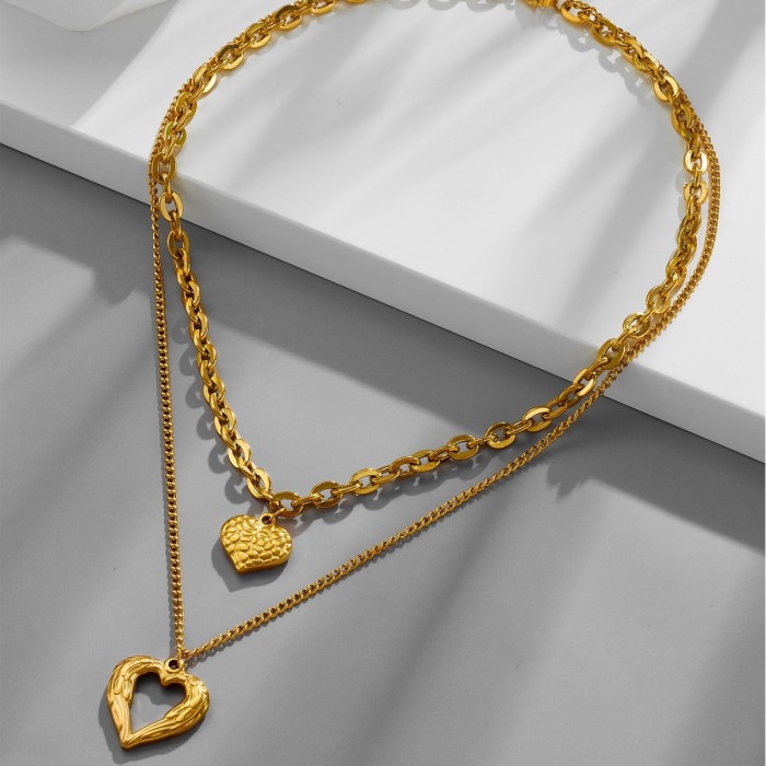 European and American cross-border vintage fashion high-end simple multi-layer titanium steel metal chain textured hollow heart pendant necklace