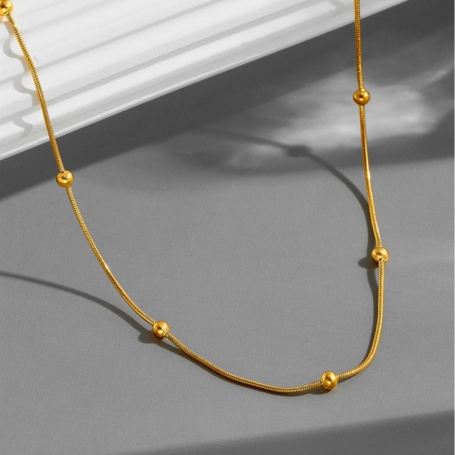 European and American internet celebrity fashion jewelry, double-layered gold bead spacer plain chain necklace for women, trendy versatile titanium steel collarbone chain