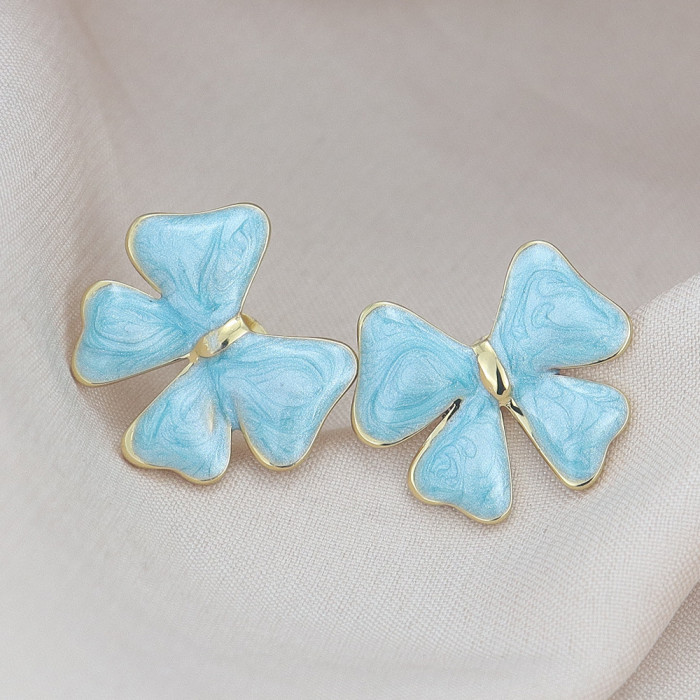 Bowknot earrings for women, simple and stylish resin earrings, NS style cross-border new stainless steel earrings