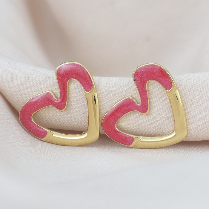 European and American fashion heart-shaped hollow oil-drip earrings, titanium steel studs, unique heart-shaped earrings, high-end trendy ear accessories