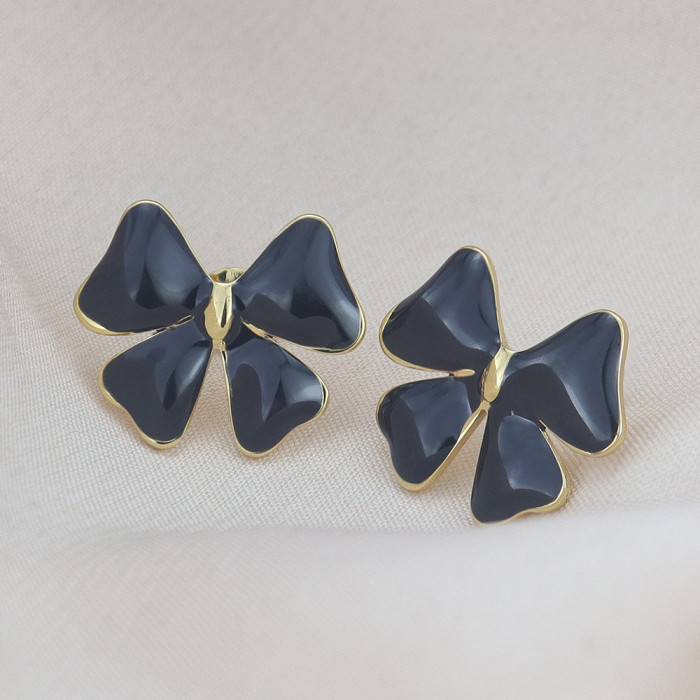 Bowknot earrings for women, simple and stylish resin earrings, NS style cross-border new stainless steel earrings
