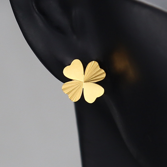 Titanium steel four-leaf clover earrings for women, simple and stylish niche design earrings, versatile metal ear cuffs for European and American commuting