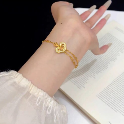 Zhao Lu Si's same style cloud-patterned Ruyi lock bag, new Chinese-style hollow diamond-encrusted gold-plated red corundum bracelet for women